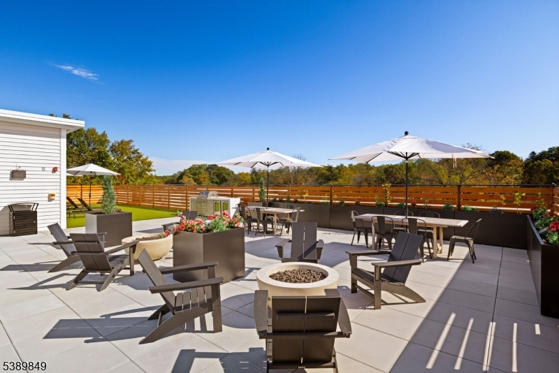 70 Ridgedale Avenue, Unit 207 Morristown, NJ 07960 - Photo 18 of 21 a view of a terrace with furniture
