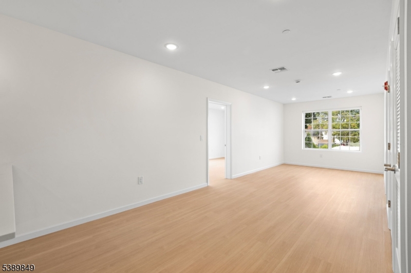 70 Ridgedale Avenue, Unit 207 Morristown, NJ 07960 - Photo 6 of 21 an empty room with a window