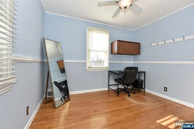 a workspace with furniture and a window