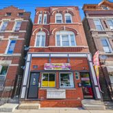a front view of a multi story residential apartment building