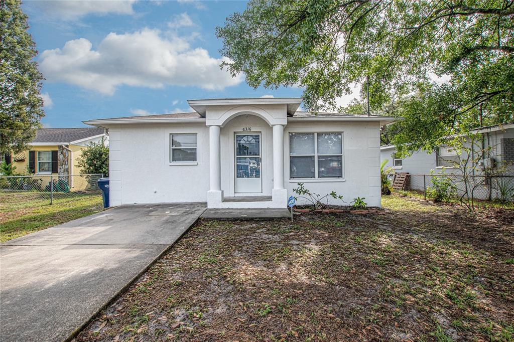 6316 South Adelia Avenue Tampa, FL 33616 - Photo 1 of 1 a front view of a house with a yard