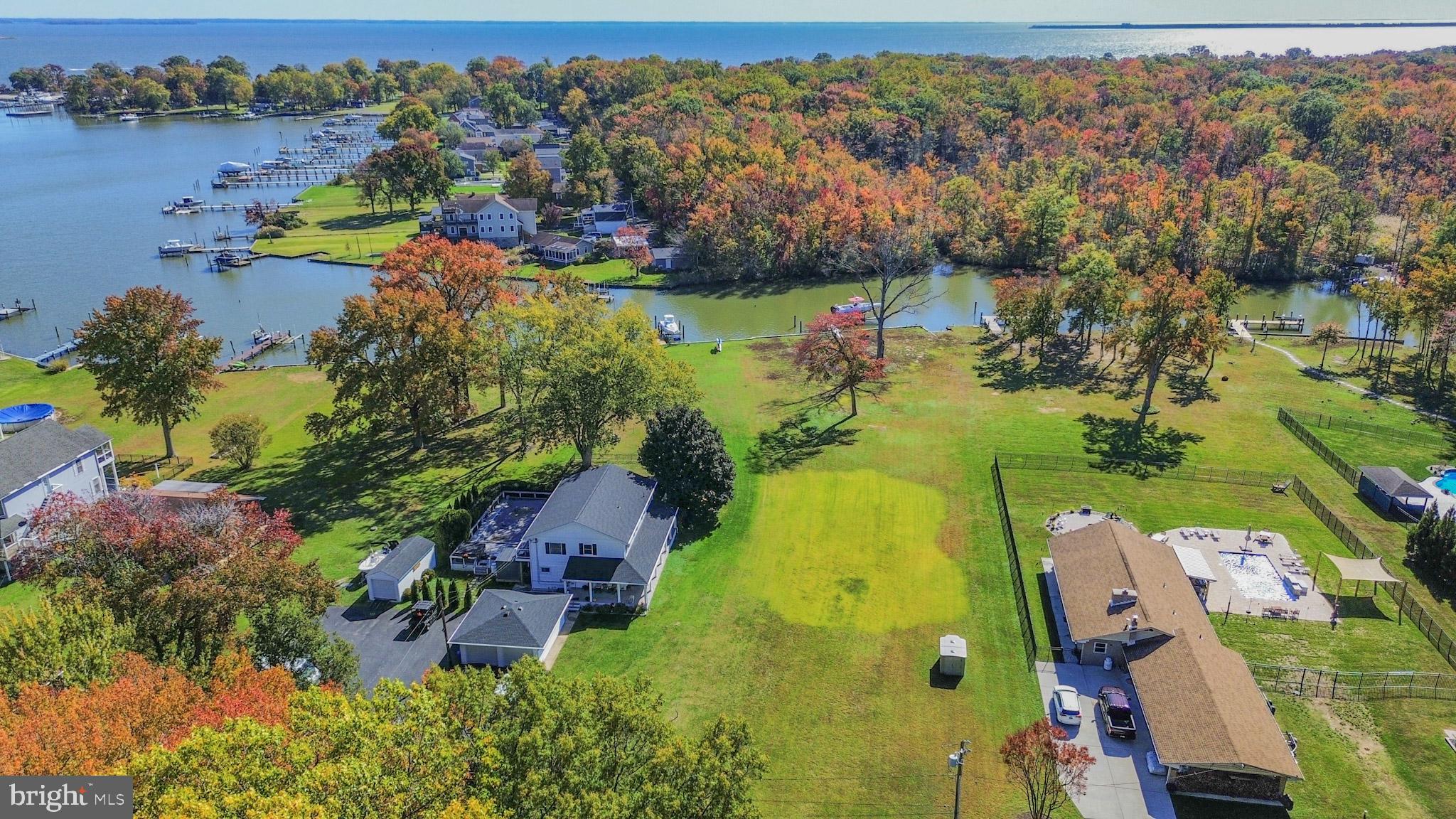 1321 South Seneca Road Middle River, MD 21220 - Photo 25 of 50 an aerial view of a residential houses with outdoor space and a lake view