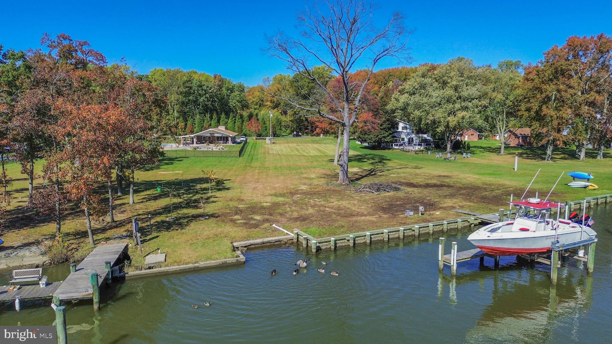 1321 South Seneca Road Middle River, MD 21220 - Photo 30 of 50 a swimming pool with outdoor seating and yard
