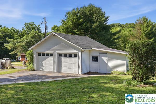 2021 Leithsville Road Hellertown, PA 18055 - Photo 5 of 39 A well-maintained detached two-car garage provides ample storage and utility space.