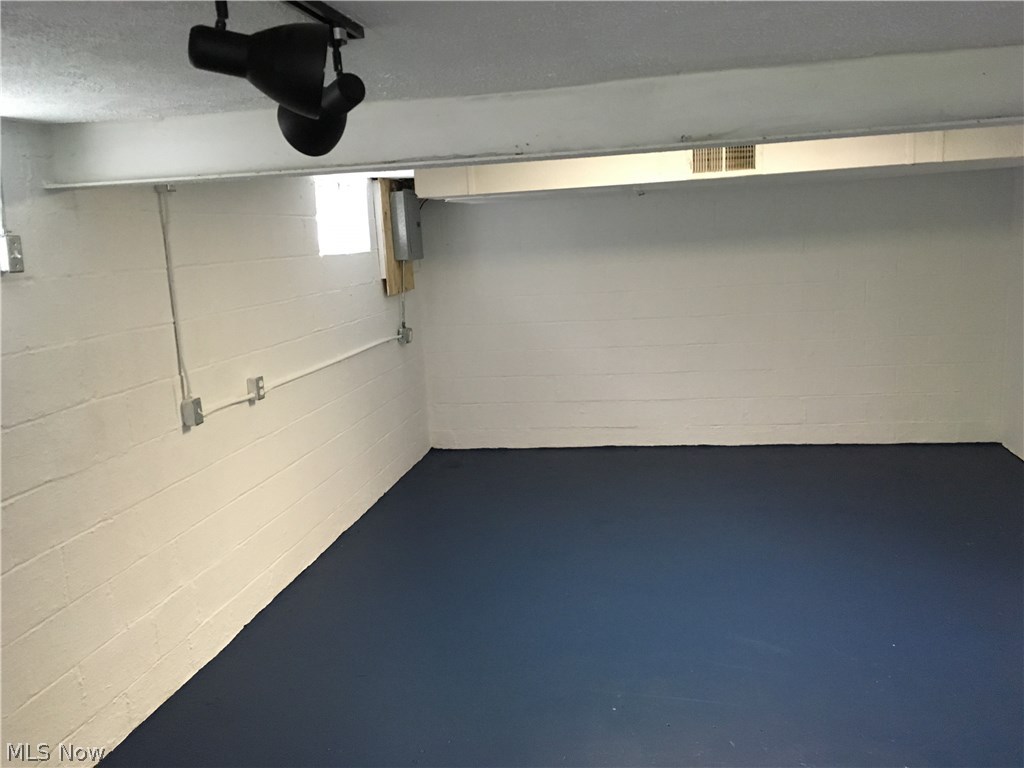 4307 Roadoan Road Brooklyn, OH 44144 - Photo 12 of 20 Brightly lit basement with freshly painted walls