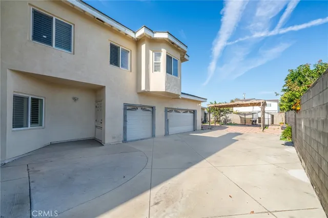 a view of a house with a street