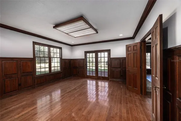 a view of a living room with furniture and a fireplace