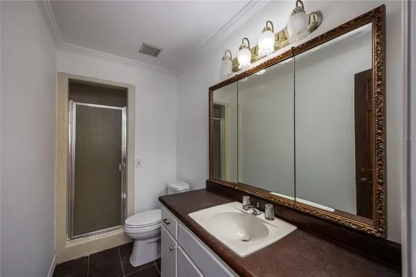 a bathroom with a sink a toilet and a bathtub