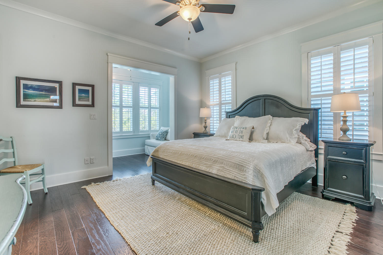 105 Lifeguard Loop West Inlet Beach, FL 32461 - Photo 13 of 45 a spacious bedroom with a bed and a chandelier