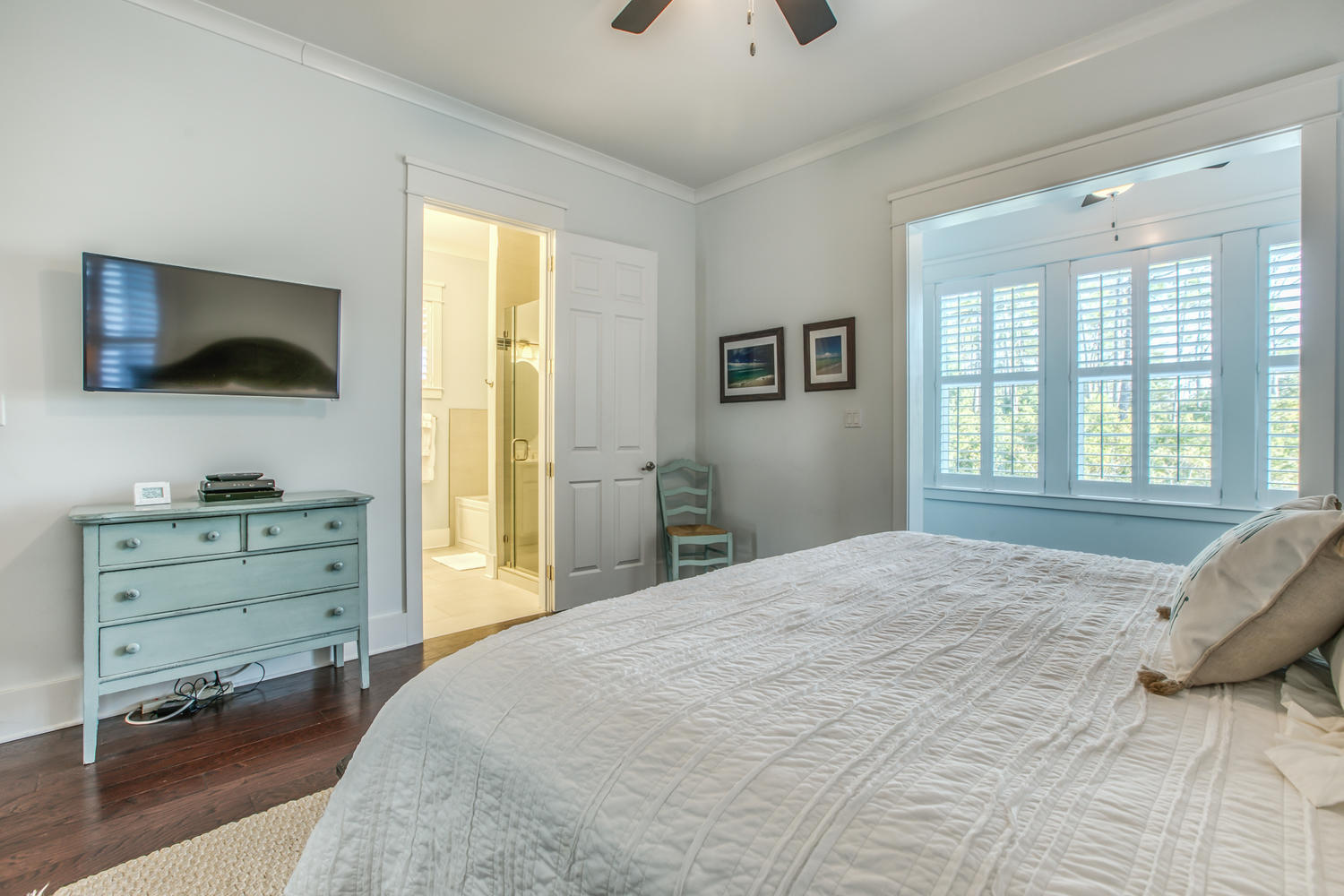 105 Lifeguard Loop West Inlet Beach, FL 32461 - Photo 15 of 45 a bedroom with a bed and a flat screen tv
