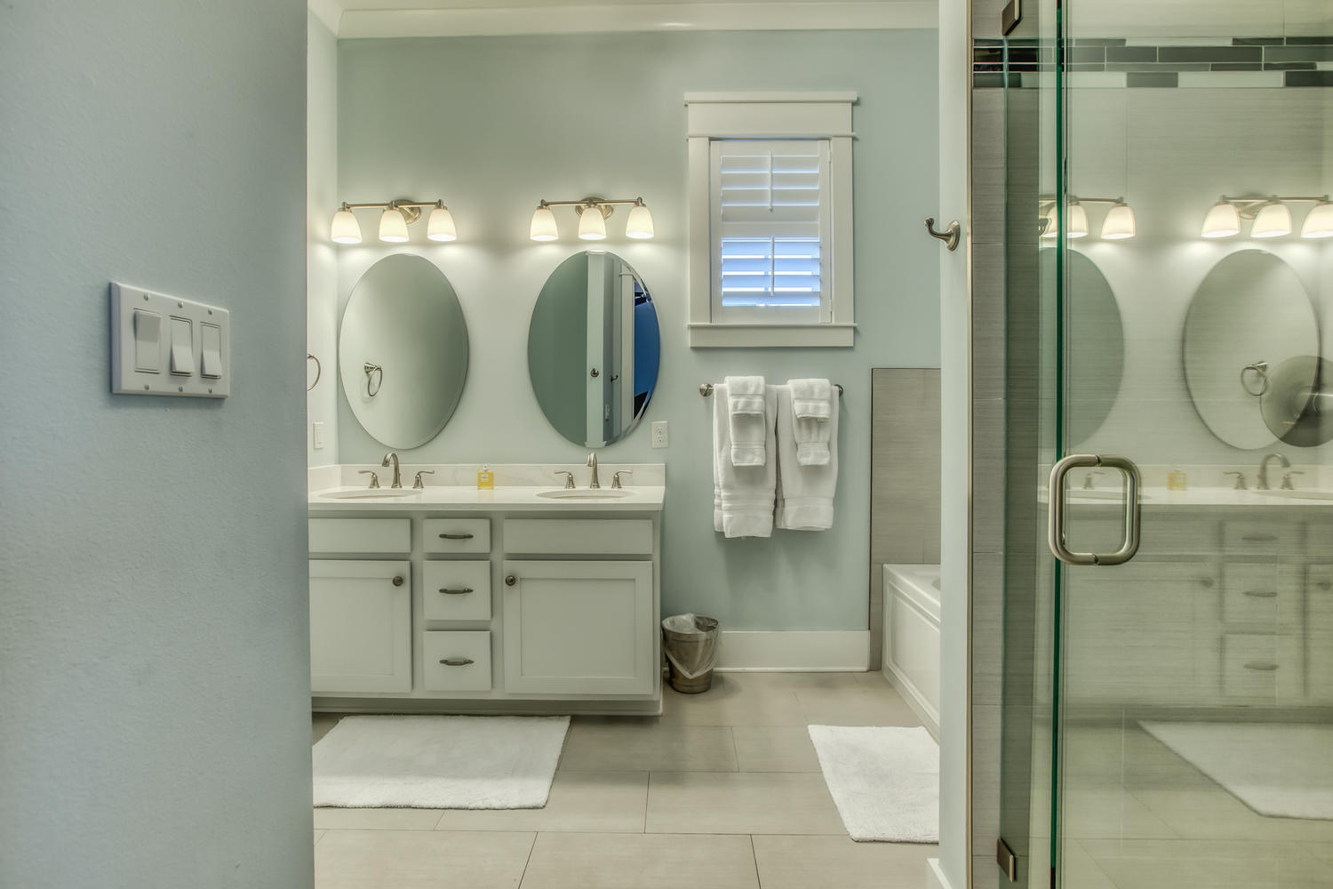 105 Lifeguard Loop West Inlet Beach, FL 32461 - Photo 18 of 45 a bathroom with a double vanity sink mirror and shower