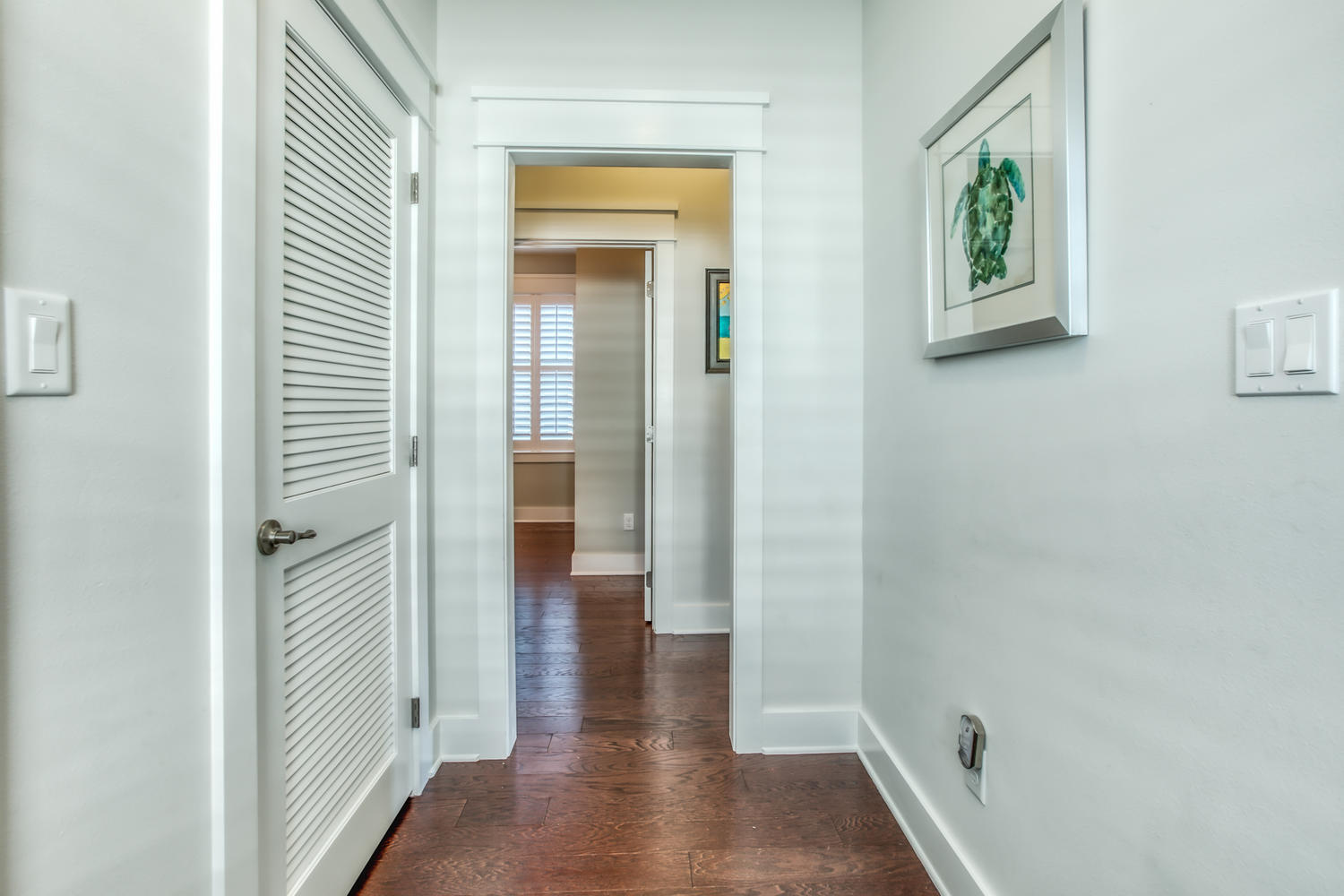 105 Lifeguard Loop West Inlet Beach, FL 32461 - Photo 23 of 45 a view of a hallway with wooden floor and closet
