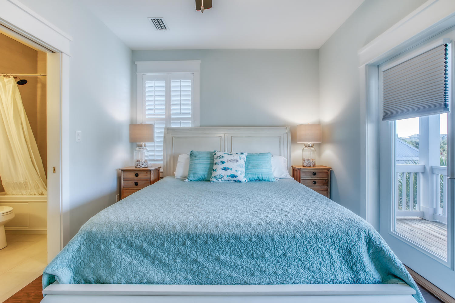 105 Lifeguard Loop West Inlet Beach, FL 32461 - Photo 25 of 45 a bedroom with a bed and a window