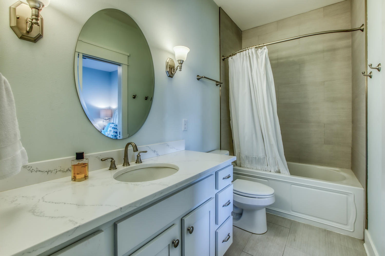 105 Lifeguard Loop West Inlet Beach, FL 32461 - Photo 28 of 45 a bathroom with a granite countertop sink toilet and shower