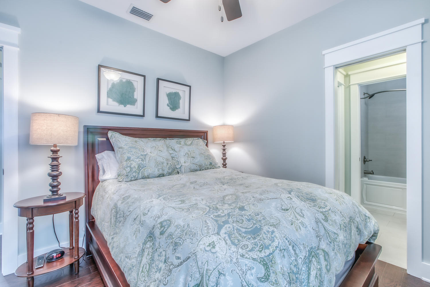 105 Lifeguard Loop West Inlet Beach, FL 32461 - Photo 29 of 45 a bedroom with a bed and a lamp