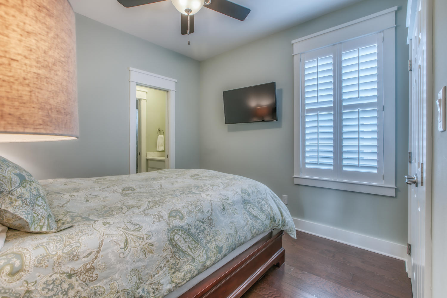 105 Lifeguard Loop West Inlet Beach, FL 32461 - Photo 30 of 45 a bedroom with a bed and a flat screen tv