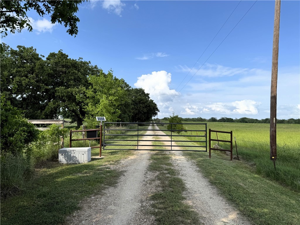 Tbd Tbd Bryan Place Lane Hearne, TX 77859 - Photo 4 of 10 a view of a lake with a garden