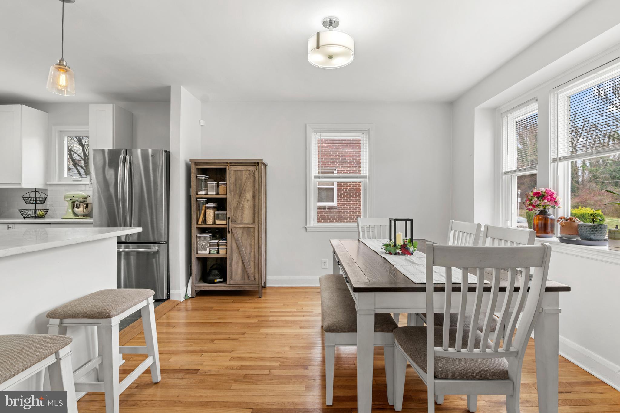 4823 Herring Run Drive Baltimore, MD 21214 - Photo 11 of 34 a view of a dining room with furniture and wooden floor