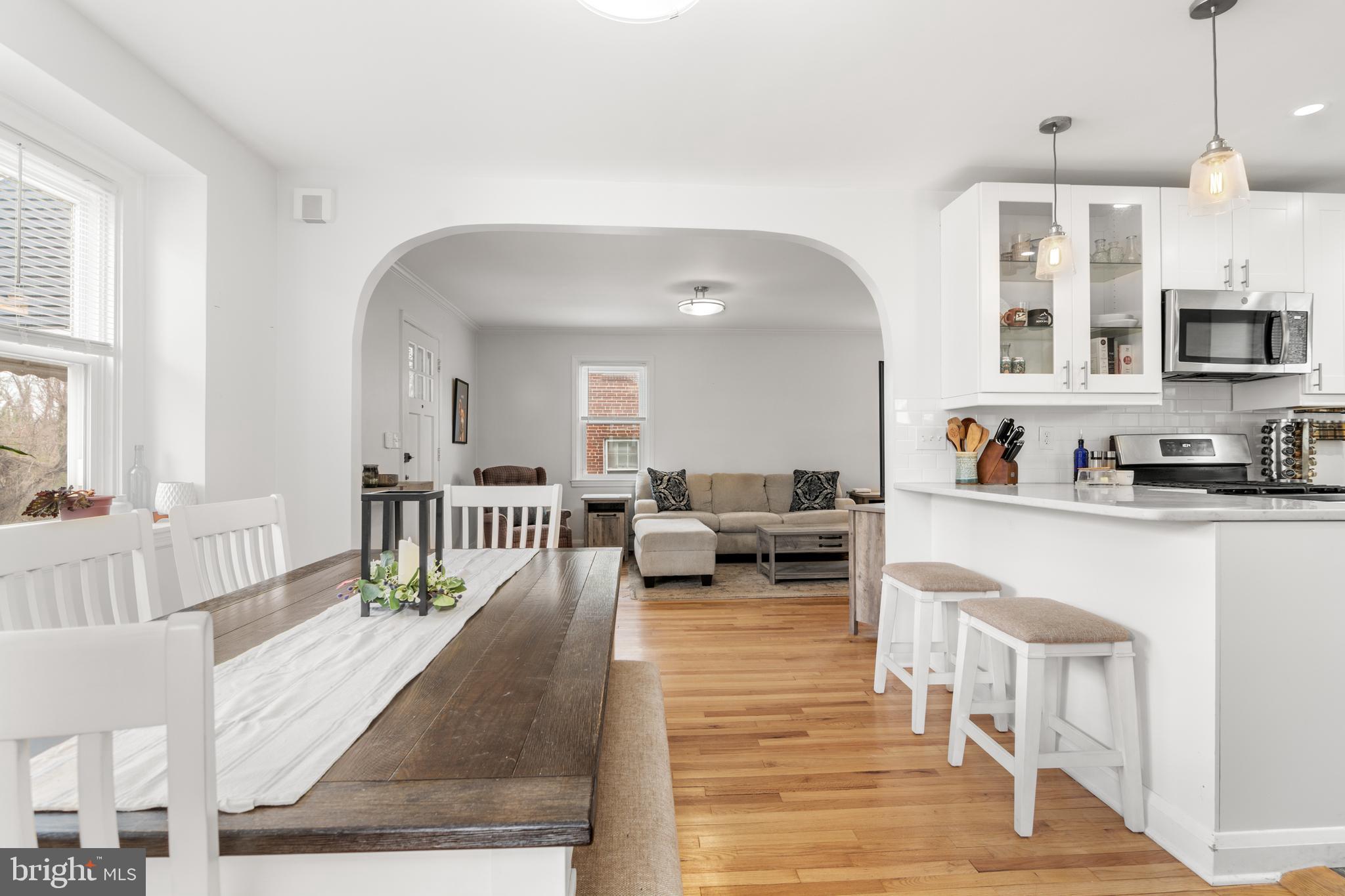 4823 Herring Run Drive Baltimore, MD 21214 - Photo 16 of 34 a living room with furniture and a flat screen tv