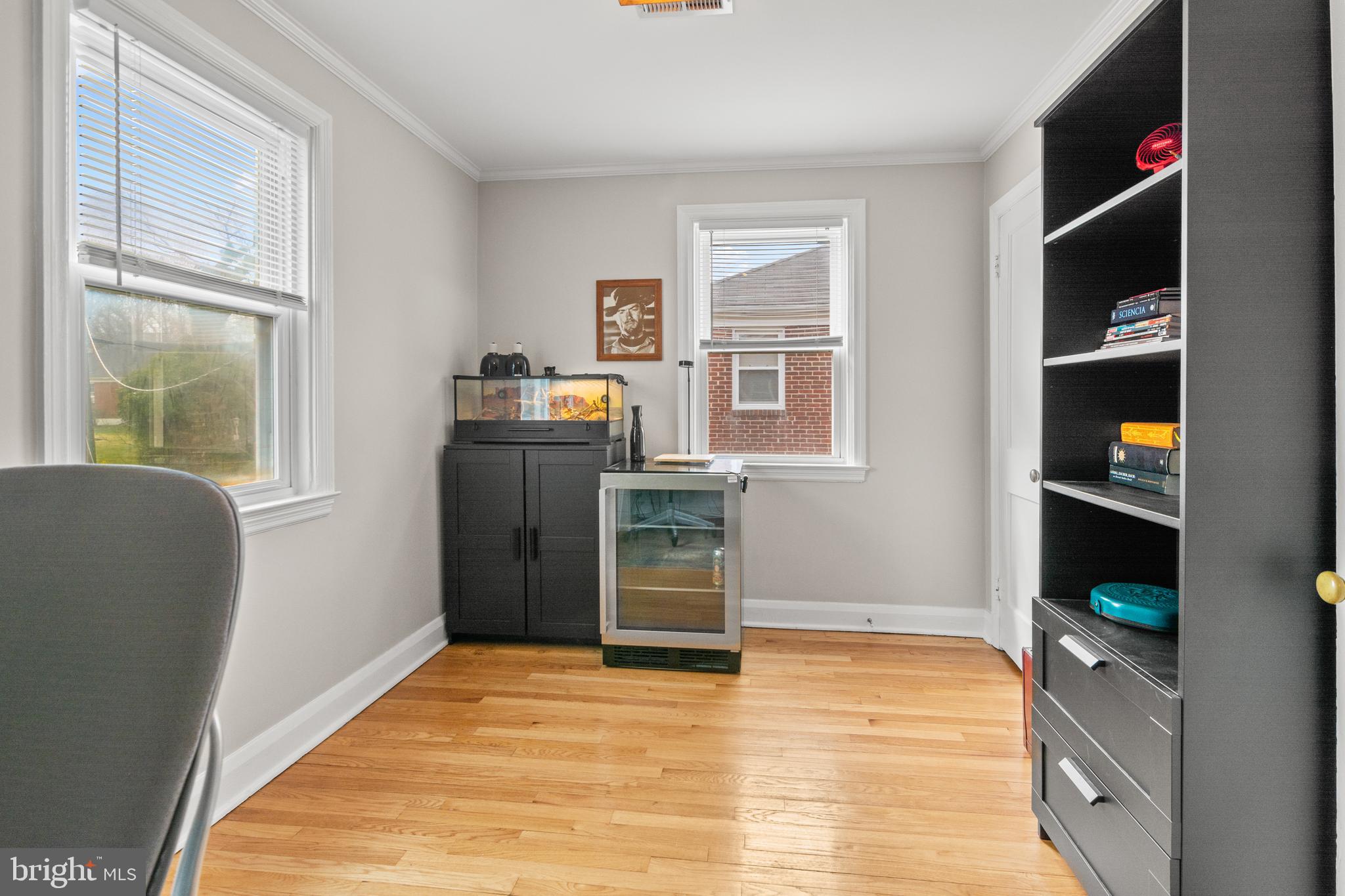 4823 Herring Run Drive Baltimore, MD 21214 - Photo 26 of 34 a room with furniture and a window