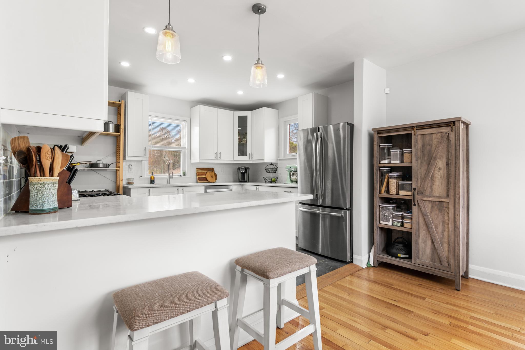 4823 Herring Run Drive Baltimore, MD 21214 - Photo 6 of 34 a kitchen with stainless steel appliances granite countertop a refrigerator and a sink
