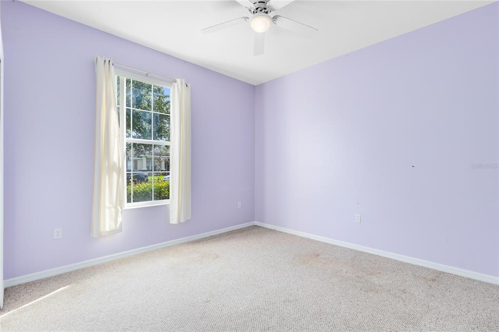 3510 Pawleys Loop South St. Cloud, FL 34769 - Photo 16 of 32 an empty room with a window
