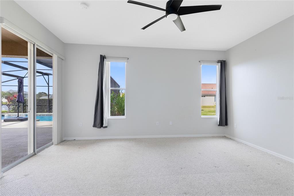 3510 Pawleys Loop South St. Cloud, FL 34769 - Photo 18 of 32 an empty room with windows