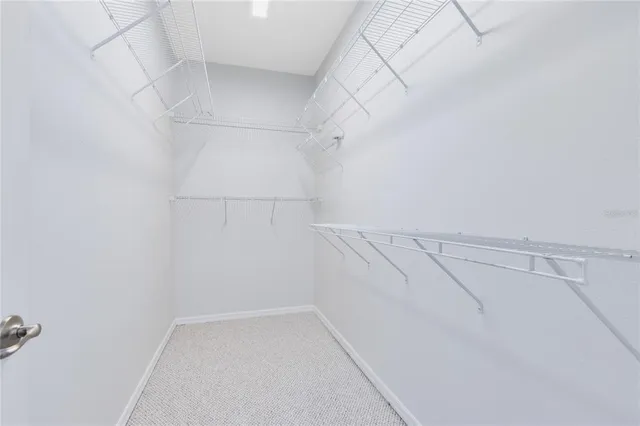 a view of a room with racks on the wall