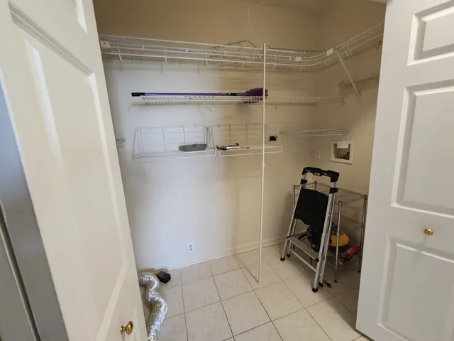 a view of a room with rack on the wall