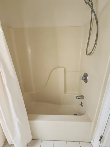 a bathroom with a bathtub