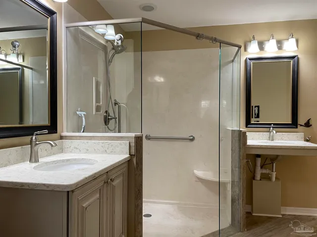 a bathroom with a sink and a mirror