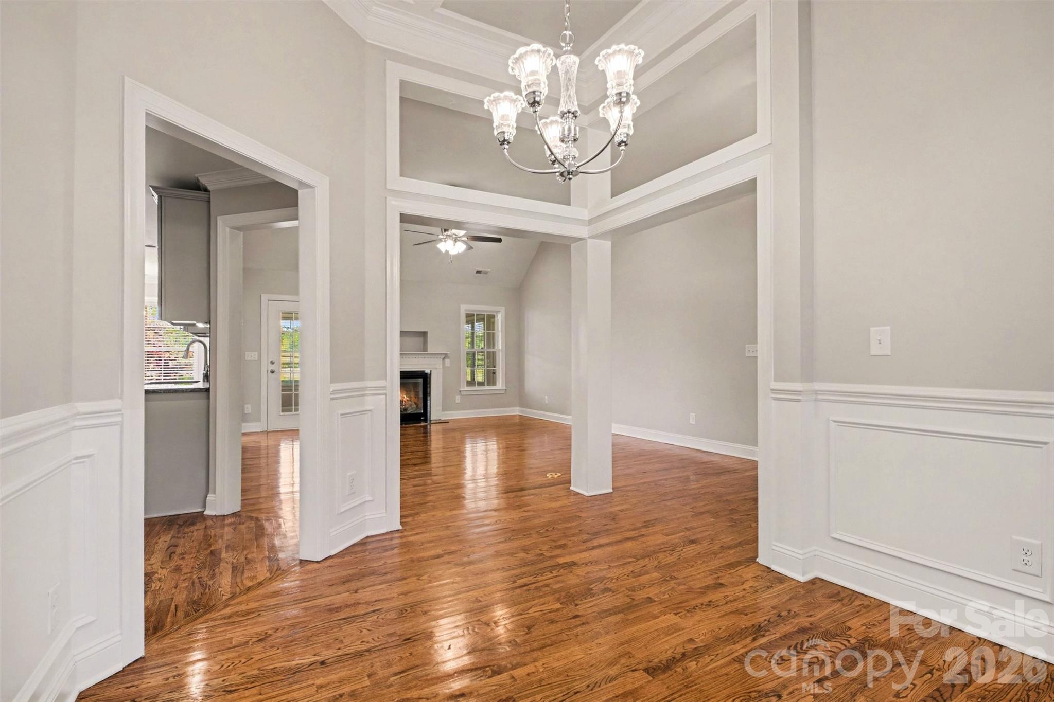 3604 Rilla Hamilton Road Monroe, NC 28110 - Photo 15 of 46 a view of a livingroom with a chandelier