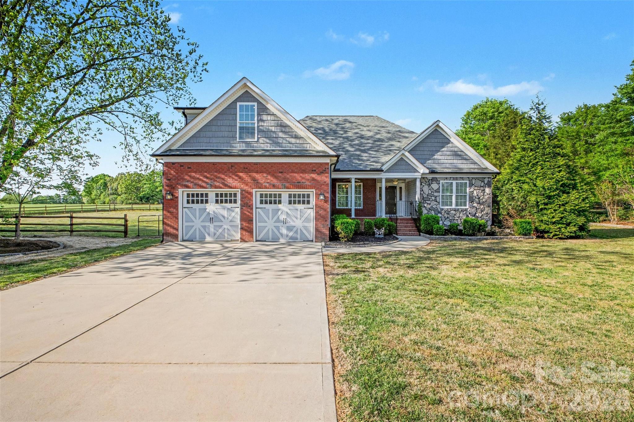 3604 Rilla Hamilton Road Monroe, NC 28110 - Photo 2 of 46 a front view of a house with a yard