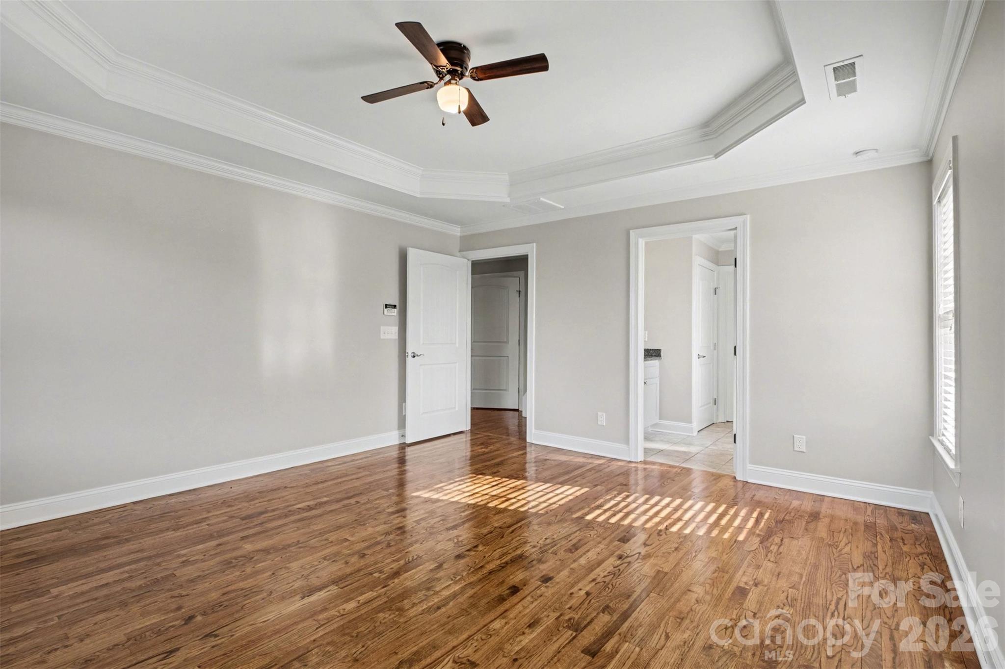 3604 Rilla Hamilton Road Monroe, NC 28110 - Photo 27 of 46 a view of empty room with wooden floor and fan