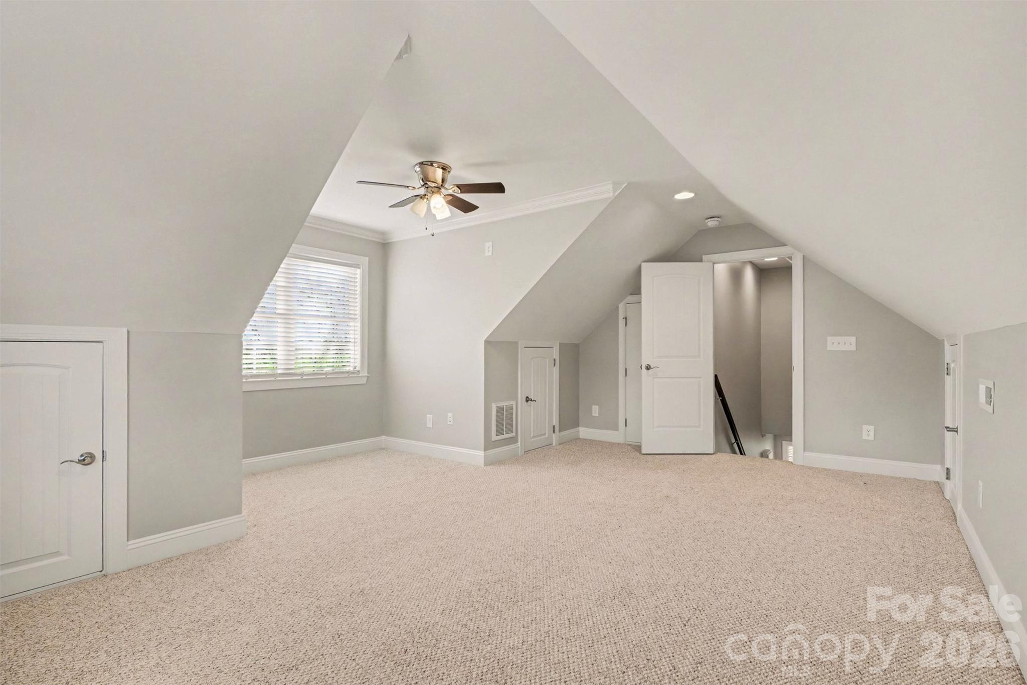 3604 Rilla Hamilton Road Monroe, NC 28110 - Photo 32 of 46 an empty room with windows and fan