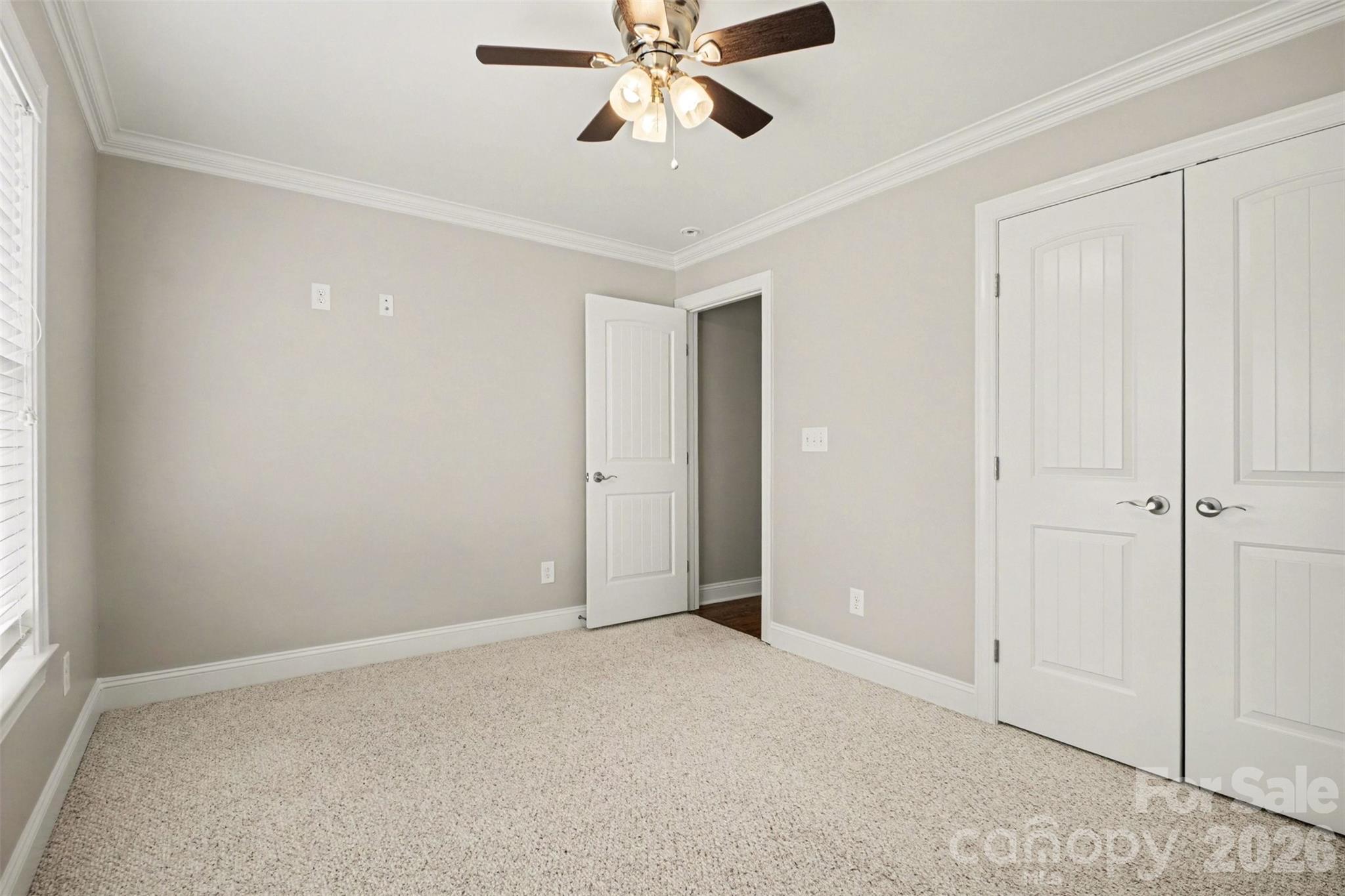 3604 Rilla Hamilton Road Monroe, NC 28110 - Photo 34 of 46 a view of an empty room and chandelier fan