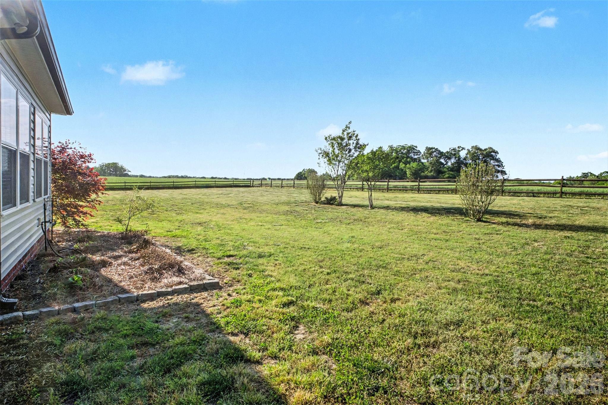 3604 Rilla Hamilton Road Monroe, NC 28110 - Photo 46 of 46 a view of a lake with a big yard