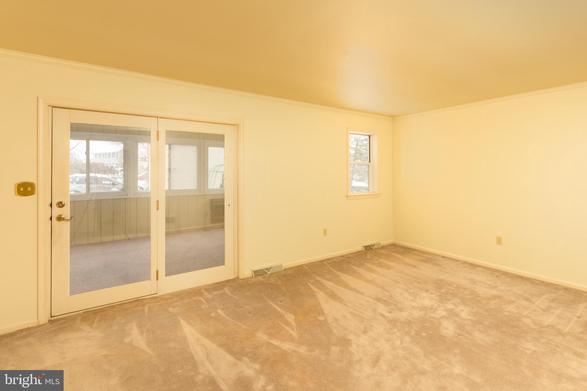 3 Lakeview Place Lititz, PA 17543 - Photo 8 of 22 Living room with access to sunroom