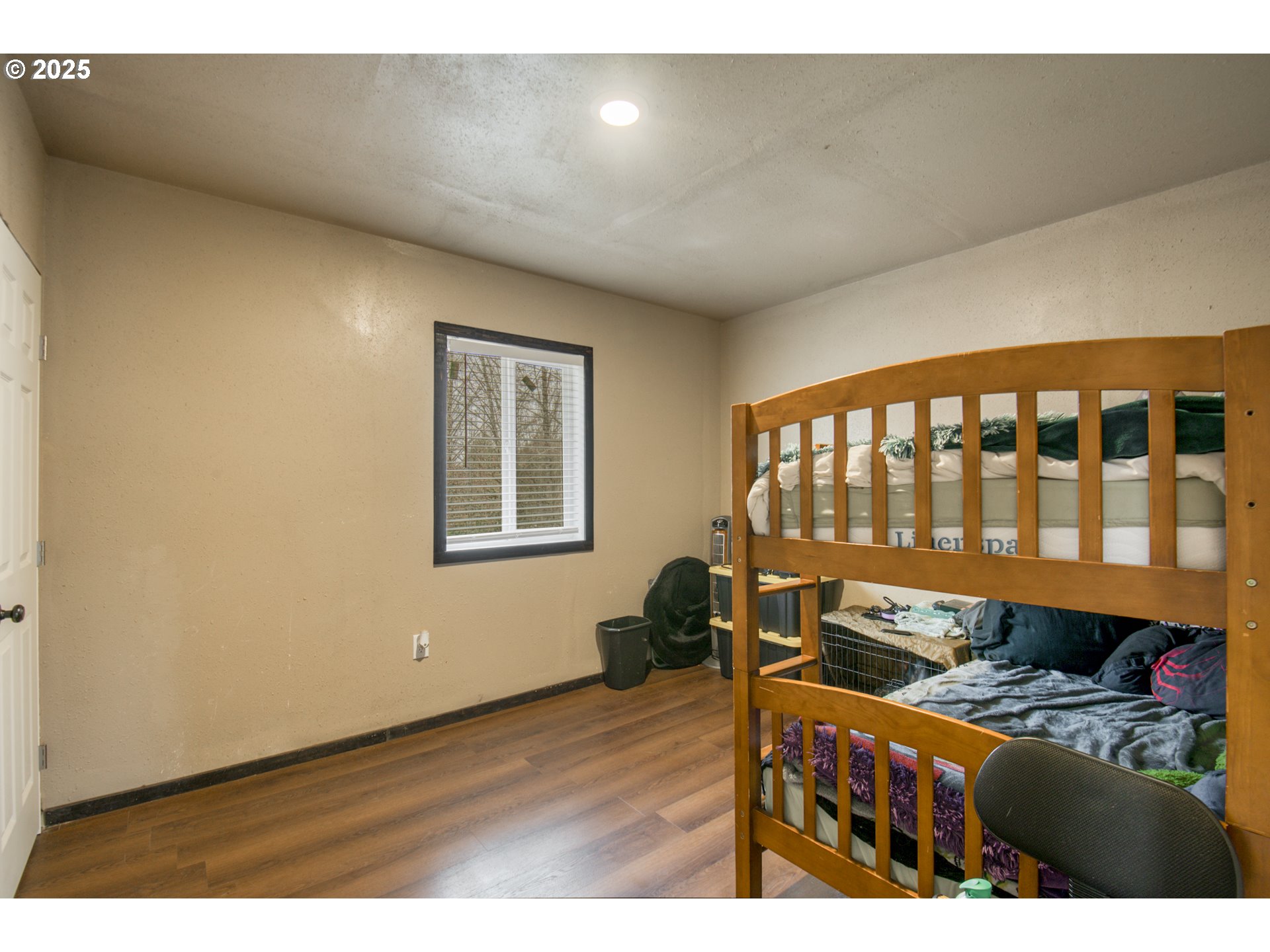 34241 Southeast Colorado Road Sandy, OR 97055 - Photo 15 of 37 a room with wooden floor and a window