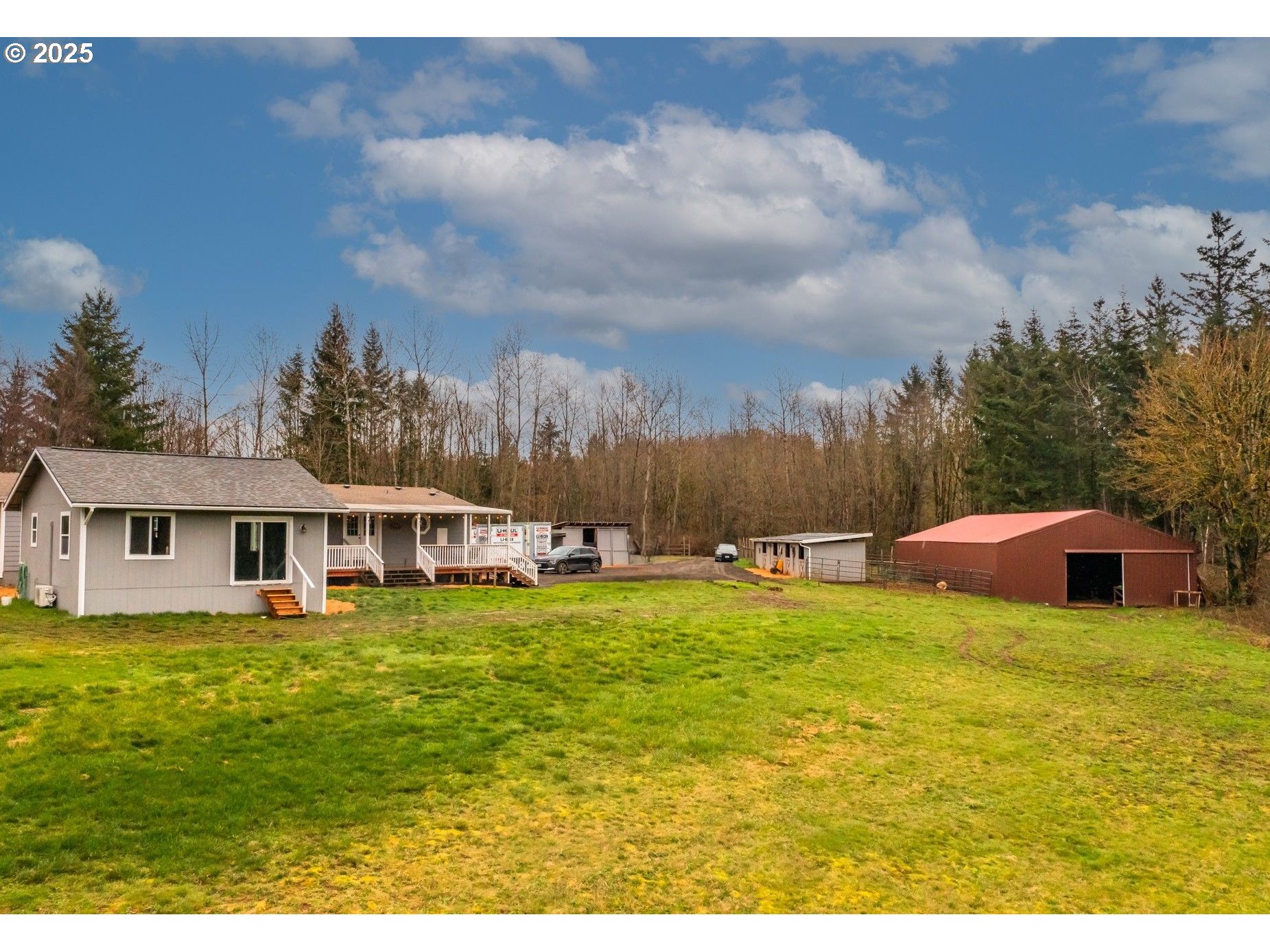 34241 Southeast Colorado Road Sandy, OR 97055 - Photo 19 of 37 a view of a house with swimming pool and a yard