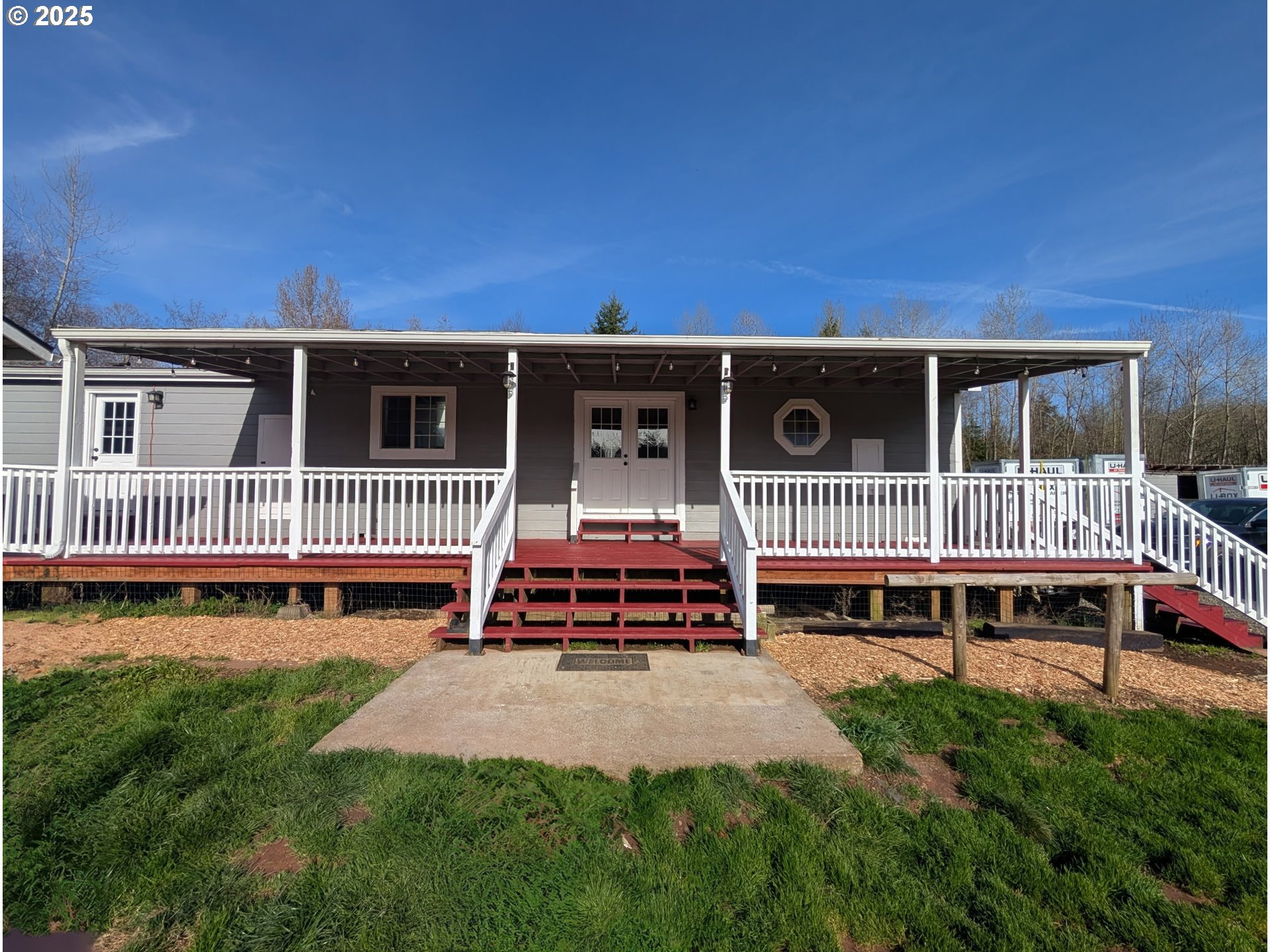 34241 Southeast Colorado Road Sandy, OR 97055 - Photo 28 of 37 a view of a deck with a house in the background