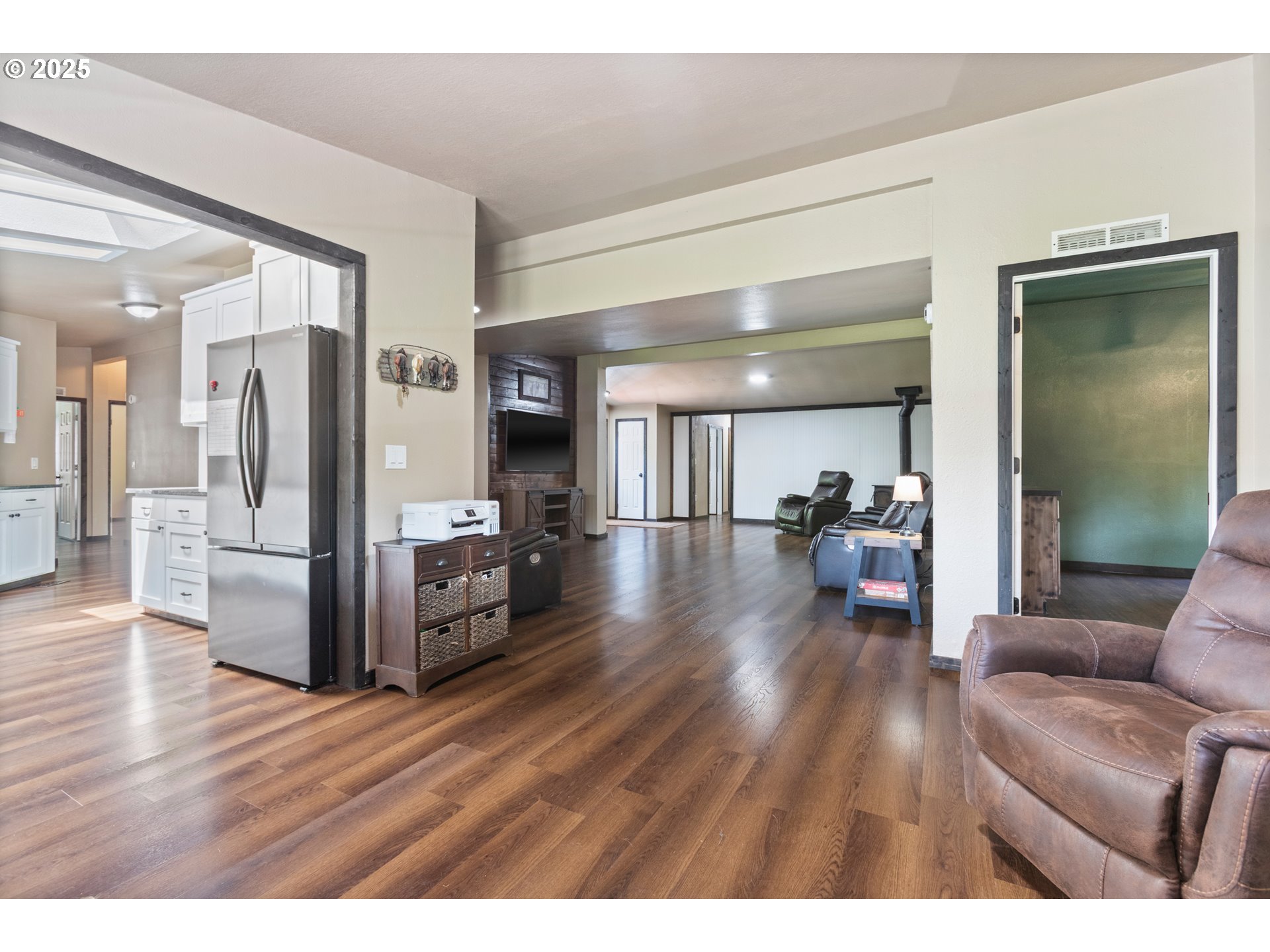 34241 Southeast Colorado Road Sandy, OR 97055 - Photo 35 of 37 a living room with furniture and a wooden floor