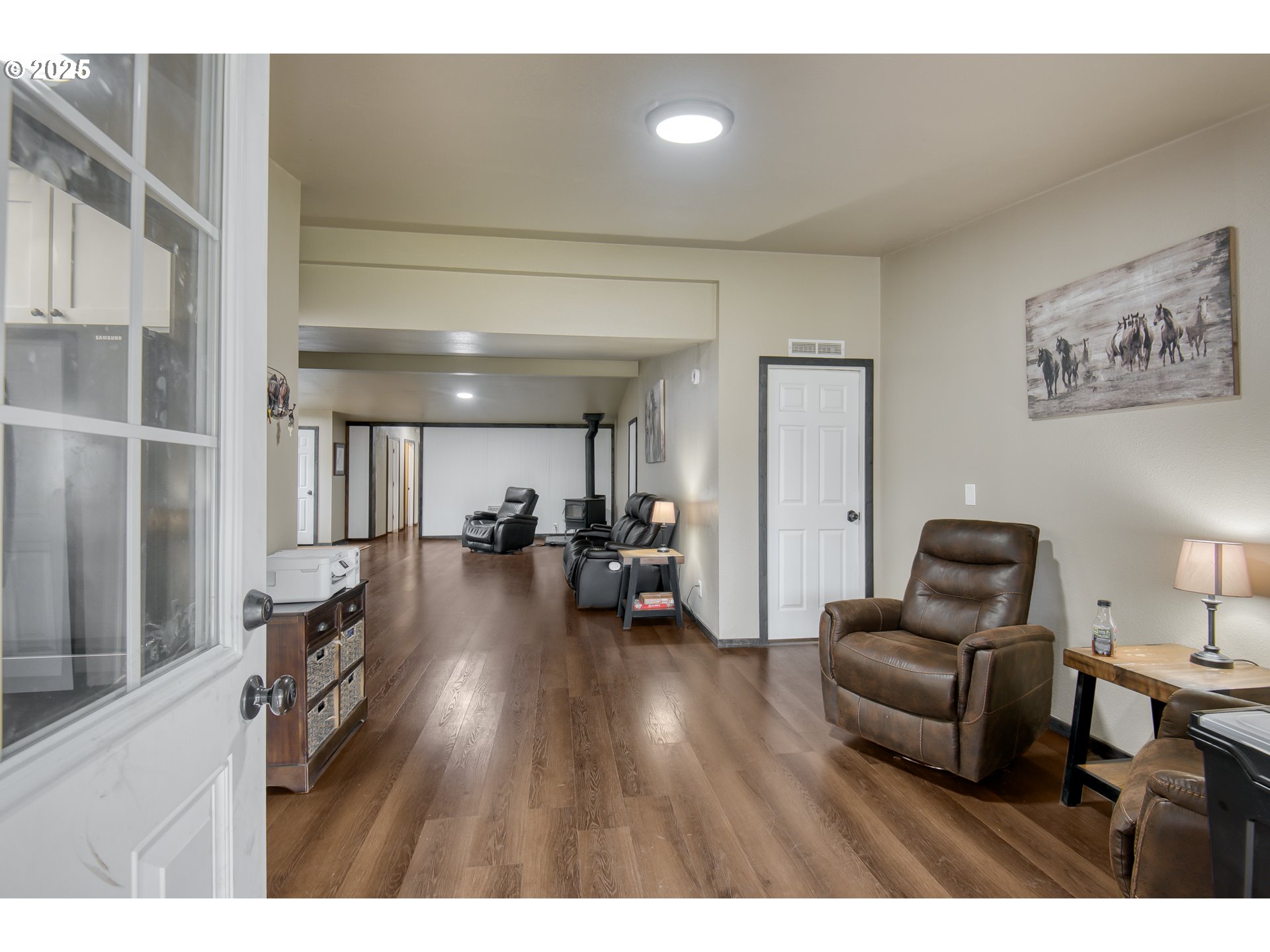 34241 Southeast Colorado Road Sandy, OR 97055 - Photo 4 of 37 a living room with furniture and a wooden floor