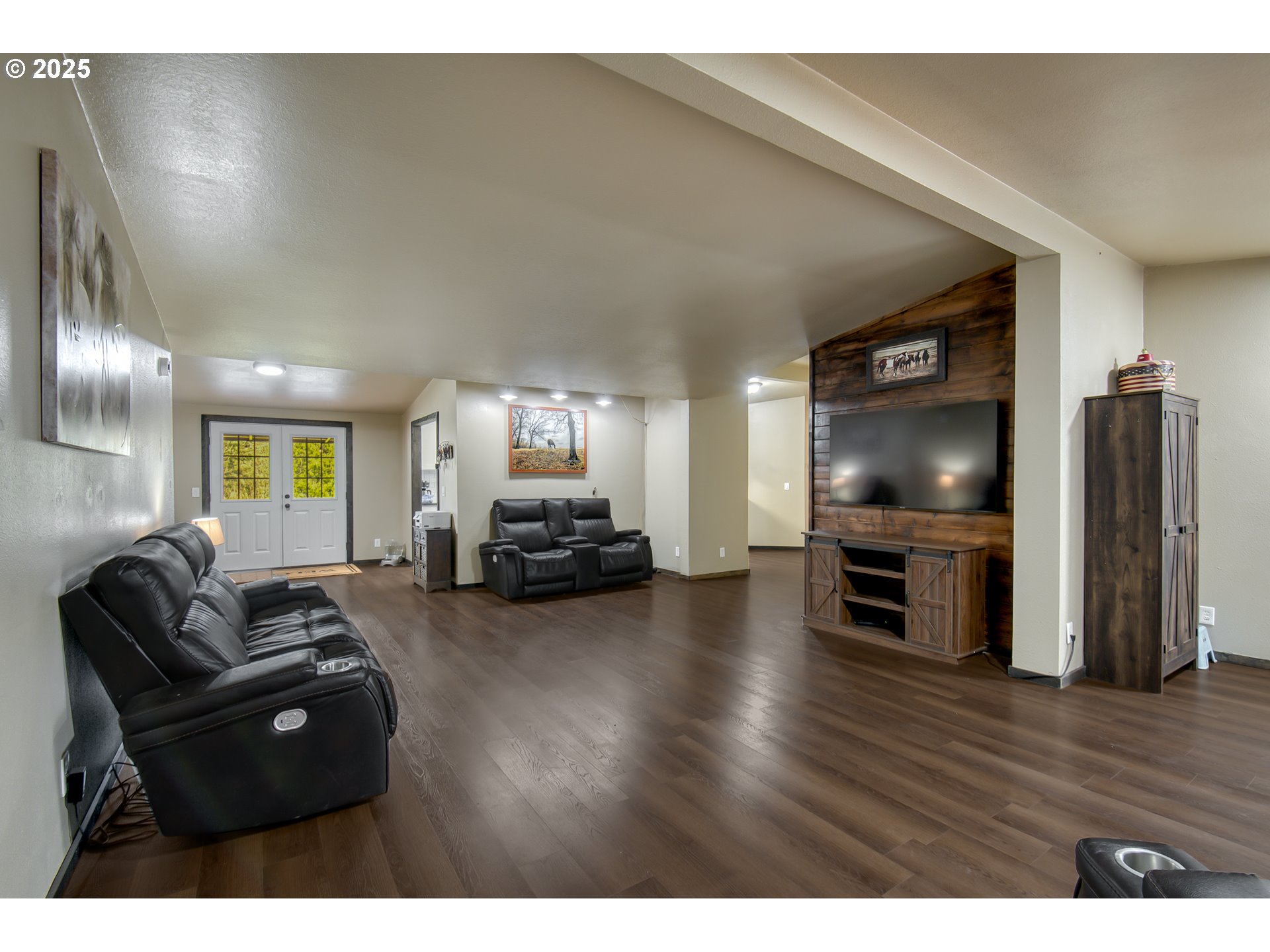 34241 Southeast Colorado Road Sandy, OR 97055 - Photo 5 of 37 a living room with furniture and a flat screen tv