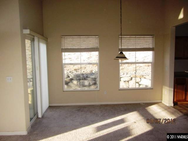 9050 Double R Boulevard, Unit 1224 Reno, NV 89521 - Photo 3 of 8 a view of an empty room and window