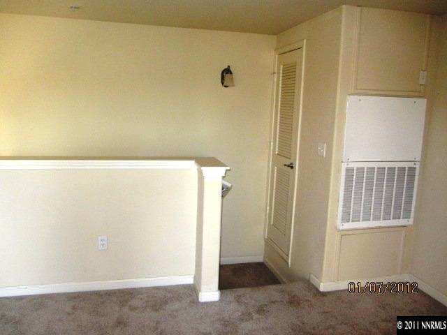 9050 Double R Boulevard, Unit 1224 Reno, NV 89521 - Photo 7 of 8 a view of an empty room