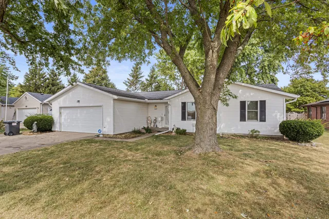 a house with trees in front of it