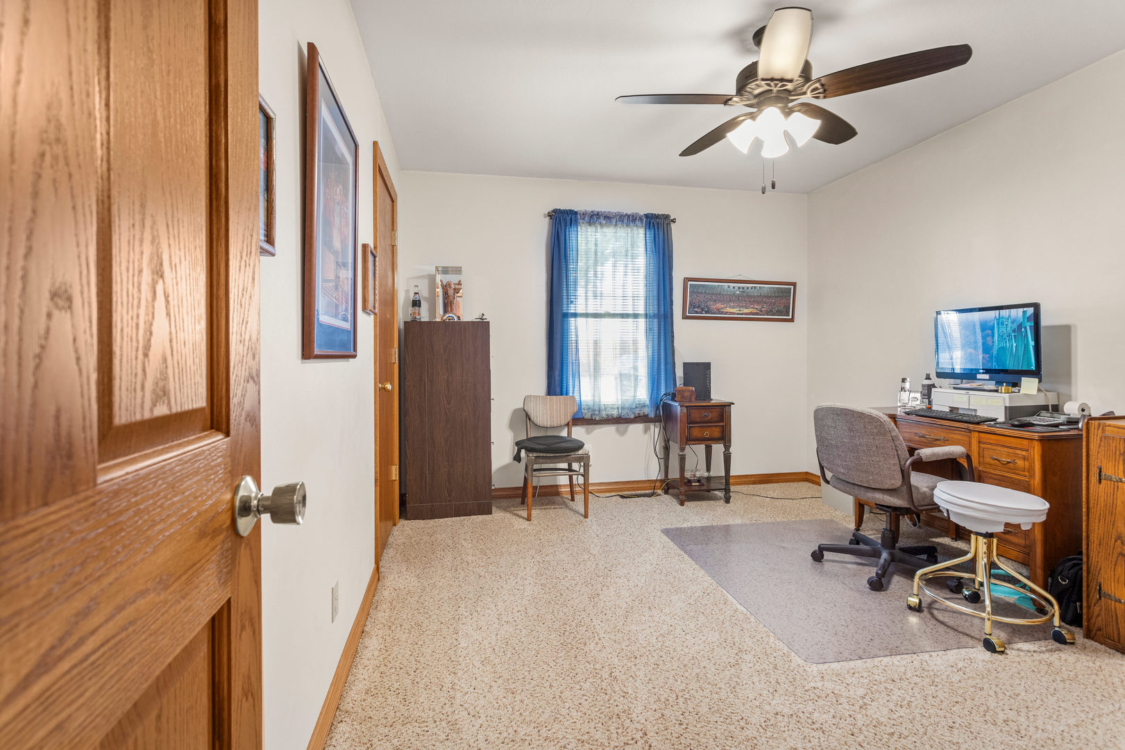 708 East Benham Street Tolono, IL 61880 - Photo 23 of 34 a view of a workspace with furniture and a window