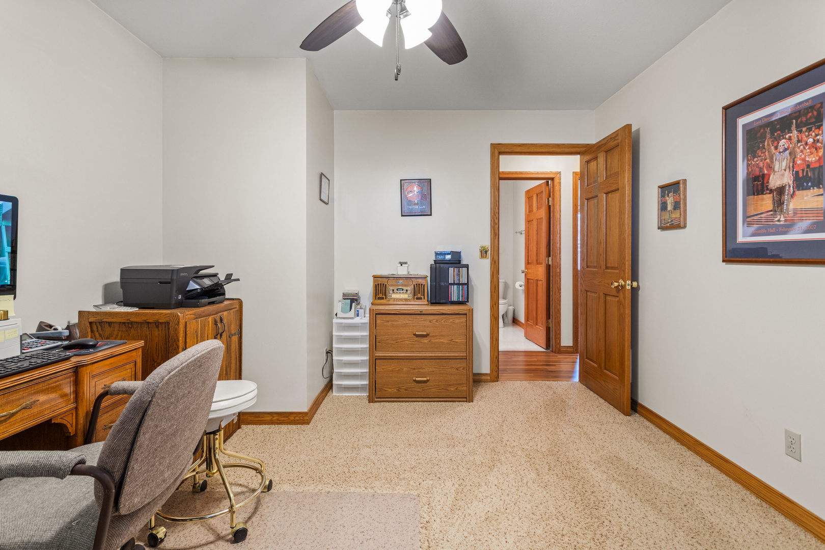 708 East Benham Street Tolono, IL 61880 - Photo 24 of 34 a view of a workspace with furniture and a window