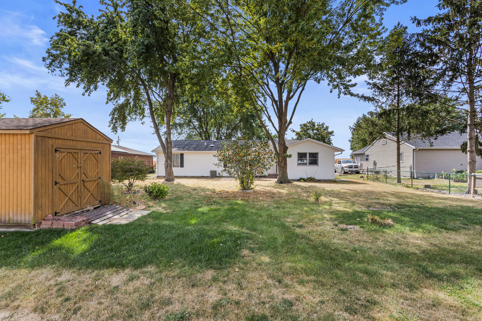 708 East Benham Street Tolono, IL 61880 - Photo 30 of 34 a view of a house with a yard